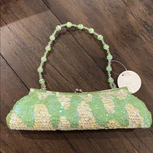 Green sequin clutch